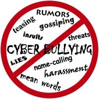 Red circle with a line through over the words Cyber Bullying