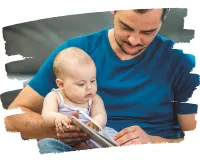 dad and baby looking at a book