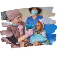 Dentist looking in a girl's mouth