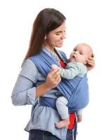 Woman carry a baby in a baby sling on her front