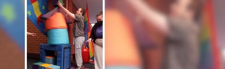 Young person building with large soft play blocks