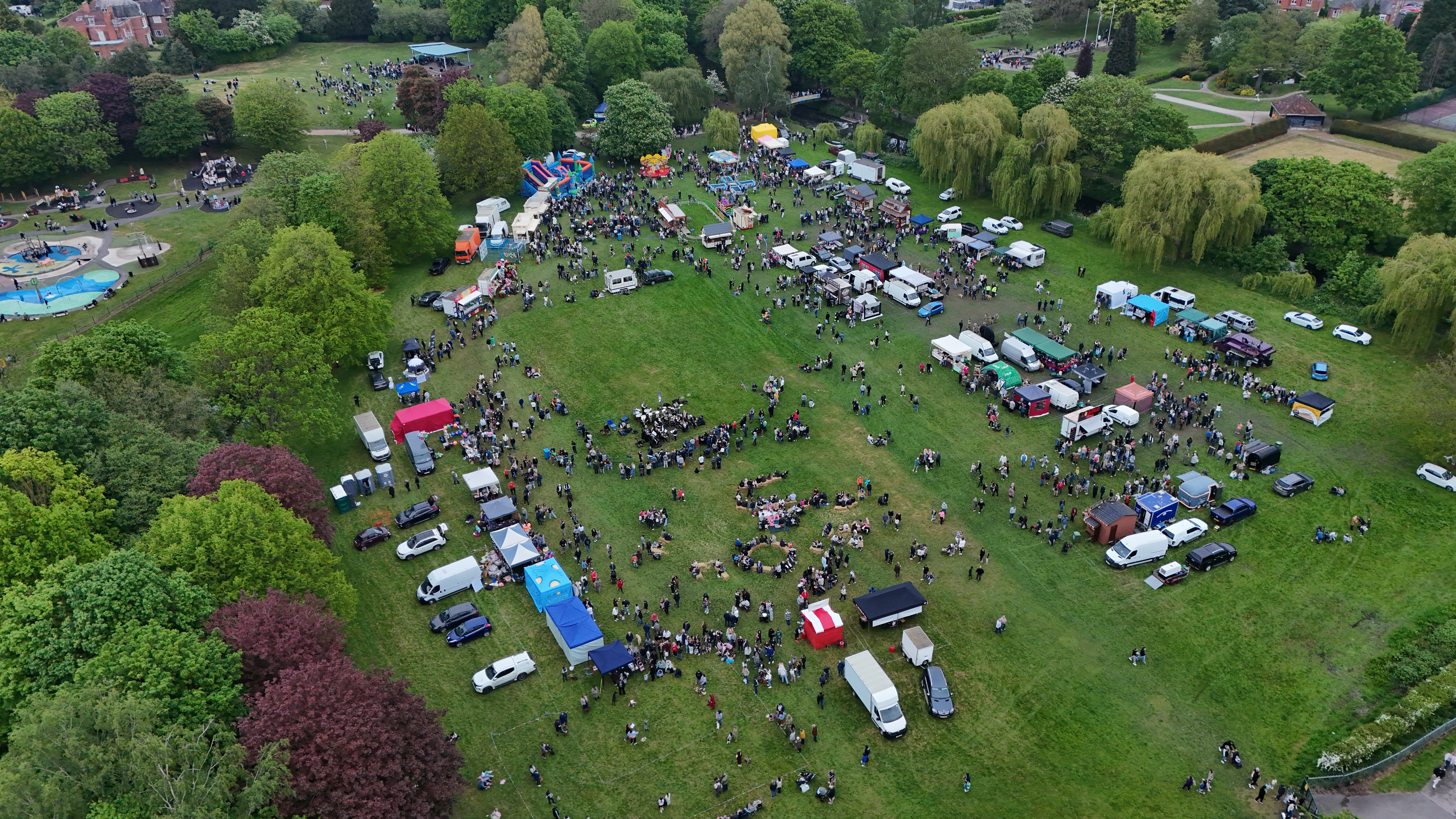An aerial shot of Kings Park Retford, filled with funfair rides and entertainment