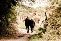 Elderly People Walking in Countryside